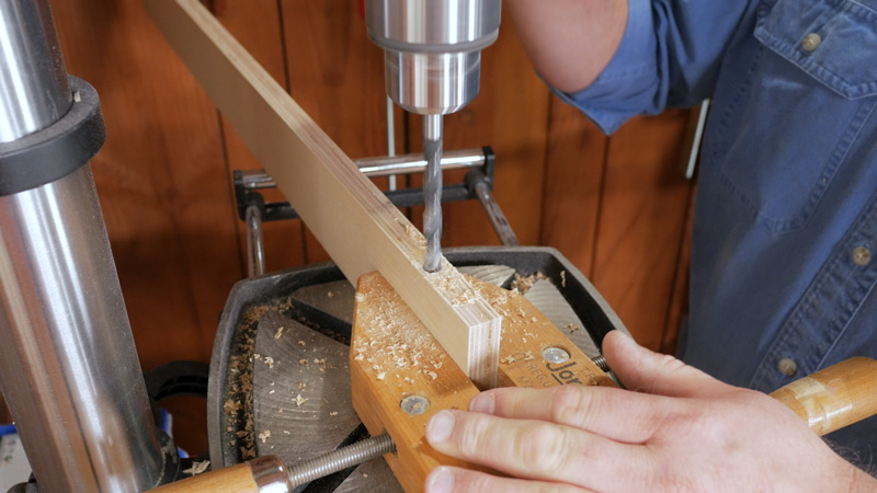 The universal fence clamps require a 3/8” hole drilled at both ends for the clamp to fit into. Drilling the holes on the drill press with a handscrew clamp keeps the holes perfectly aligned.