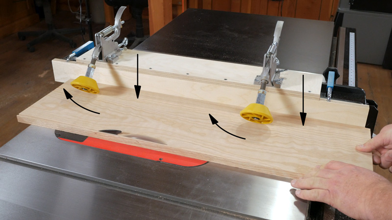 As you feed the workpiece each roller applies a small amount of downward pressure. It also pulls the workpiece slightly towards the fence, keeping it aligned with the cut.